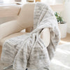 MARBLE FAUX FUR/MINKY THROW BLANKETS - Luxuriously soft Saranoni Marble Faux Fur/Minky home throw on a chair