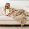 PATTERNED FAUX FUR THROW BLANKETS - Saranoni blanket enhancing the comfort of a bedroom