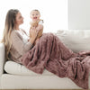 PATTERNED FAUX FUR THROW BLANKETS - Saranoni blanket bringing warmth and comfort to any room