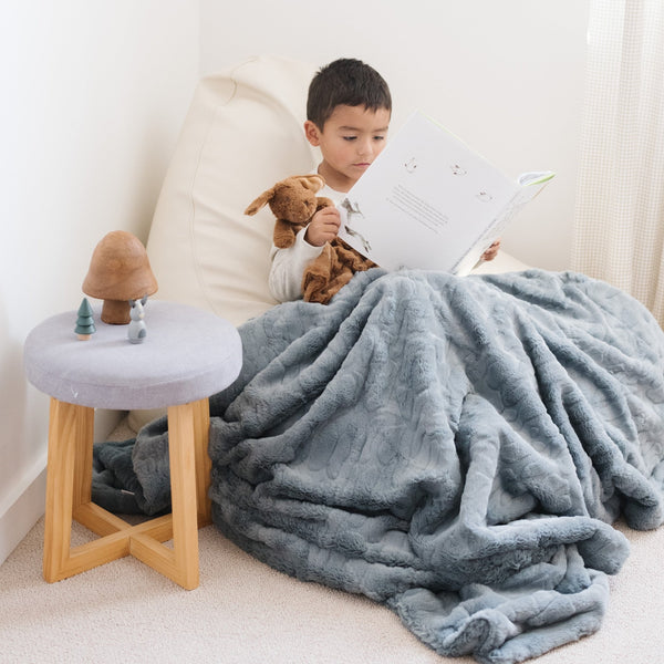 PATTERNED FAUX FUR THROW BLANKETS - Saranoni blanket providing both warmth and comfort