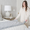 PATTERNED FAUX FUR THROW BLANKETS - Elegant Saranoni throw blanket on a master bed. 