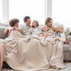 Entire family snuggled together in gorgeous Light Gray Moonbeam RIBBED BAMBONI KING BLANKETS - Saranoni