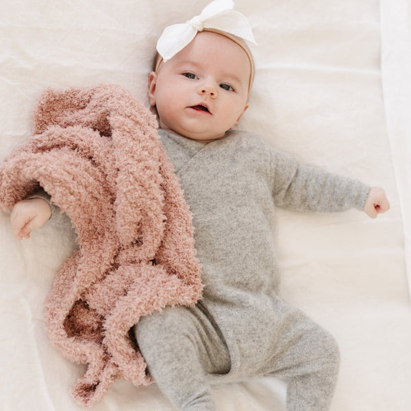 Adorable baby with soft and tiny Sunkissed RIBBED BAMBONI MINI BLANKETS - Saranoni