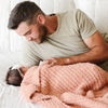 Dad snuggling with newborn baby girl in adorable Peach/Pink Sunkissed RIBBED BAMBONI RECEIVING BLANKETS - Saranoni