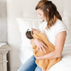 Mom holding newborn baby in super cozy Yellow Golden RIBBED BAMBONI RECEIVING BLANKETS - Saranoni