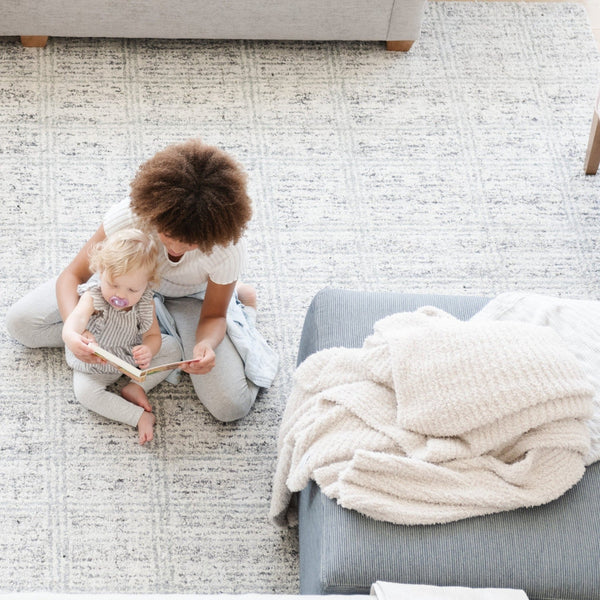 Little kids reading a book together-- home decor with beautiful Light Gray Moonbeam RIBBED BAMBONI THROW BLANKETS - Saranoni