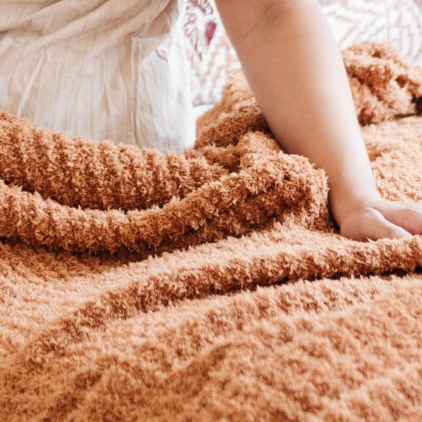 Details of extra soft and stretchy, warm and comfy cozy burnt orange Ginger RIBBED BAMBONI XL BLANKETS - Saranoni