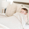 Little boy falling asleep under extra soft and cozy light gray Moonbeam RIBBED BAMBONI XL BLANKETS - Saranoni