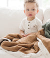 Luxurious satin-backed receiving blanket, ideal for cradling your baby in comfort and style.