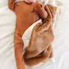 Luxurious satin-backed receiving blanket, ideal for cradling your baby in comfort and style.