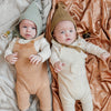 Receiving blanket with a gentle, plush front and a satin back, providing a cozy and elegant wrap for your little ones..