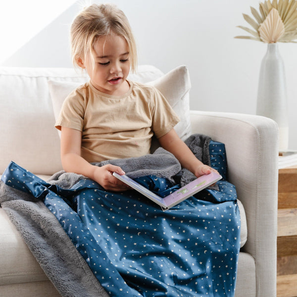 Soft and cozy, toddler blanket with a satin back, perfect for snuggling and keeping warm.