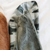 Soft and luxurious green camo and tan satin back toddler blankets. 