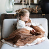 Elegant satin-backed toddler blanket, featuring a soft, cushioned front for coziness and a silky, smooth underside for added luxury.