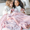 Cuddly Saranoni toddler blanket, designed to envelop your child in a soft, plush embrace for ultimate coziness.