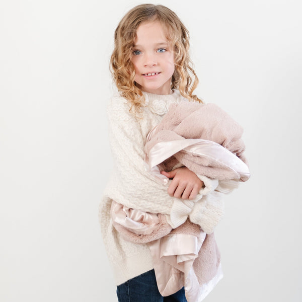 Ultra-soft Saranoni toddler blanket, perfect for wrapping your little one in warmth and comfort.