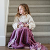 Cozy Saranoni toddler blanket, featuring a plush feel that provides comfort and security for your little one..