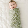 Newborn baby boy wrapped in cozy, soft, STRETCHY SWADDLE - Saranoni