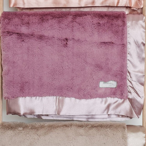 A beautiful set of carefully curated Saranoni blankets.