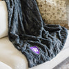 A Luxury Throw Charcoal Colored Patterned Faux Fur Saranoni Blanket. The soft blanket is a throw blanket and has a soft faux fur feeling. The blanket has a Weber State University Logo.