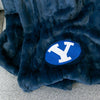 A Luxury Throw Midnight (dark blue) Colored Patterned Faux Fur Saranoni Blanket. The soft blanket is a throw blanket and has a soft faux fur feeling. The blanket has a Brigham Young University Logo.