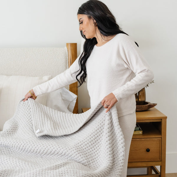 King-sized blanket featuring a breathable waffle knit design, offering a cozy yet lightweight feel for year-round comfort.