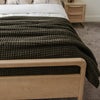 Versatile king-size waffle knit blanket, ideal for adding texture and warmth to any bed.