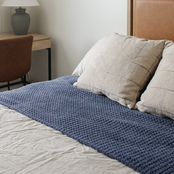 Stylish queen blanket with a lightweight waffle knit texture for easy layering.